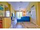 Well-lit living space with an open design, connecting the kitchen, living area, and balcony for a seamless flow at 8341 38Th Street Cir E # 303, Sarasota, FL 34243