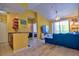 Spacious open floor plan with kitchen, living room, and balcony with natural light, ceiling fan, and modern decor at 8341 38Th Street Cir E # 303, Sarasota, FL 34243