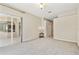 Large bedroom with neutral carpet offers sliders to a patio and easy access to other rooms at 9008 Brookfield Ter, Bradenton, FL 34212