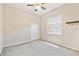 Bright bedroom with neutral paint, carpet floors, a ceiling fan and natural light at 9008 Brookfield Ter, Bradenton, FL 34212