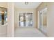 Covered patio with views of the interior through sliding glass doors and bay windows at 9008 Brookfield Ter, Bradenton, FL 34212