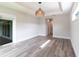 Bright bedroom with decorative ceiling and sliding glass doors overlooking outdoors at 9017 Province St, Sarasota, FL 34240