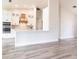 Modern kitchen featuring sleek white cabinetry, stainless steel appliances, and stylish countertops at 9017 Province St, Sarasota, FL 34240