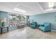 Bright common area with comfortable seating and large windows showcasing scenic views, perfect for relaxation at 9393 Midnight Pass Rd # 603, Sarasota, FL 34242
