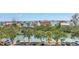 Picturesque neighborhood with tropical trees, lush landscaping, and waterway views from this multi-story complex at 9393 Midnight Pass Rd # 603, Sarasota, FL 34242