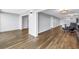 Open living space with wood floors, neutral walls, and an airy feel at 9393 Midnight Pass Rd # 603, Sarasota, FL 34242