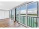 Bright room with large windows, offering a scenic waterfront view from inside at 9393 Midnight Pass Rd # 603, Sarasota, FL 34242