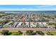 Aerial view of waterfront community featuring canal access, residential homes, and beautiful surroundings at 9822 Desoto Ct, Bradenton, FL 34210