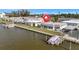 Waterfront community with private docks, boat lift and stunning water views, ideal for boating enthusiasts at 9822 Desoto Ct, Bradenton, FL 34210
