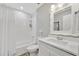 Bright bathroom featuring modern fixtures, white tile accents, and a sleek vanity at 9822 Desoto Ct, Bradenton, FL 34210