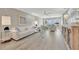 Bright living room with stylish furniture and large windows offering waterfront views at 9822 Desoto Ct, Bradenton, FL 34210