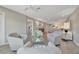 Bright living room featuring recessed lighting, ceiling fan, and open floor plan at 9822 Desoto Ct, Bradenton, FL 34210