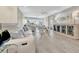 Comfortable living room with chic decor, sleek furniture, and scenic water views at 9822 Desoto Ct, Bradenton, FL 34210