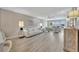 Spacious living room with bright neutral tones, lots of natural light and water views at 9822 Desoto Ct, Bradenton, FL 34210