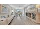 Well-lit living room with coastal decor, modern furnishings, and scenic water views at 9822 Desoto Ct, Bradenton, FL 34210