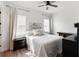 Bright bedroom with natural light, neutral decor, and comfortable furnishings at 10030 Degas Ter, Bradenton, FL 34212