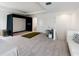 Large bonus room with a movie theater and adjacent bathroom at 10030 Degas Ter, Bradenton, FL 34212