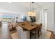 Open-concept dining area with backyard view and access to the home's open living area at 10030 Degas Ter, Bradenton, FL 34212