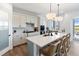 Spacious kitchen with a large island and seating, perfect for entertaining guests at 10030 Degas Ter, Bradenton, FL 34212