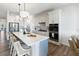 Bright kitchen features a large island with seating and modern stainless steel appliances at 10030 Degas Ter, Bradenton, FL 34212