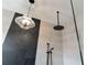 Contemporary shower featuring a glass partition and modern light fixture at 10030 Degas Ter, Bradenton, FL 34212