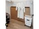 Walk-in closet with laundry basket and ample storage space at 10030 Degas Ter, Bradenton, FL 34212