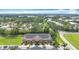 Beautiful aerial shot of townhomes surrounded by lush landscaping in a well-planned community at 1053 Grantham Dr, Sarasota, FL 34234