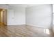Bright, spacious bedroom featuring light wood floors and a large window at 1053 Grantham Dr, Sarasota, FL 34234