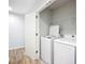 A conveniently located laundry area with modern washer and dryer units at 1053 Grantham Dr, Sarasota, FL 34234