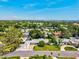 Aerial view of the property showcasing the surrounding neighborhood and its proximity to local amenities at 1324 Augusta S Ln, St Petersburg, FL 33707