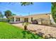 Charming backyard with a paved patio area, ideal for outdoor entertaining and relaxation at 1324 Augusta S Ln, St Petersburg, FL 33707