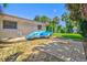 Paver parking area with a boat trailer in the side yard at 1324 Augusta S Ln, St Petersburg, FL 33707