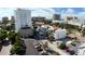 An aerial view of the complex, showcasing its location, landscaping, ample parking and cityscape at 1345 2Nd St, Sarasota, FL 34236