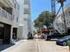 A street view of the complex featuring plenty of parking and an ongoing construction project at 1345 2Nd St, Sarasota, FL 34236