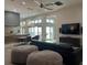 Bright living room features an open floor plan, modern decor, and great natural light throughout at 1345 2Nd St, Sarasota, FL 34236