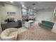 Cozy lounge featuring stylish decor, soft seating, and modern amenities at 1345 2Nd St, Sarasota, FL 34236