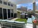 Enjoy the city views from this fantastic patio, featuring a grill and comfortable seating area at 1345 2Nd St, Sarasota, FL 34236