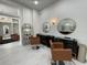 Bright salon space featuring sleek styling stations, modern decor, and ample natural light at 1345 2Nd St, Sarasota, FL 34236