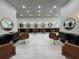 Wide salon view showing multiple stations, large mirrors, and modern interior design at 1345 2Nd St, Sarasota, FL 34236