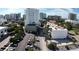 An aerial view of a street with residential buildings and many trees at 1345 2Nd St, Sarasota, FL 34236