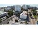 An aerial view of a street with residential buildings and many trees at 1345 2Nd St, Sarasota, FL 34236