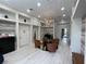 Modern waiting area features comfortable chairs and accent lighting for a welcoming atmosphere at 1345 2Nd St, Sarasota, FL 34236