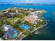 Picturesque waterfront community featuring private docks, lush landscaping, and stunning ocean views at 1423 & 1435 Hillview Dr, Sarasota, FL 34239