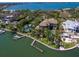 Waterfront estate boasts a private dock, pool, and lush landscaping, offering a serene retreat at 1423 & 1435 Hillview Dr, Sarasota, FL 34239