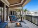 This luxurious balcony features outdoor seating and a fire pit, all while offering unobstructed views of the area at 1423 & 1435 Hillview Dr, Sarasota, FL 34239