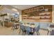 Charming cafe area with modern decor, cozy seating, and a coffee bar for residents and guests at 15752 Sacile Ln, Bradenton, FL 34211