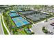 Aerial view of multiple tennis and pickleball courts, offering ample recreational opportunities for residents at 15752 Sacile Ln, Bradenton, FL 34211
