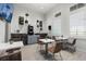 Cozy coffee bar with modern seating, wall decor with plants, a coffee machine, and natural light at 16012 Sunny Day Dr, Bradenton, FL 34211