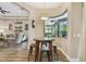 Breakfast nook with breakfast bar, natural light, and view to the outside entertainment area at 16246 26Th E St, Parrish, FL 34219