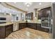 Spacious kitchen with granite counters, stainless appliances, and an open layout at 16246 26Th E St, Parrish, FL 34219